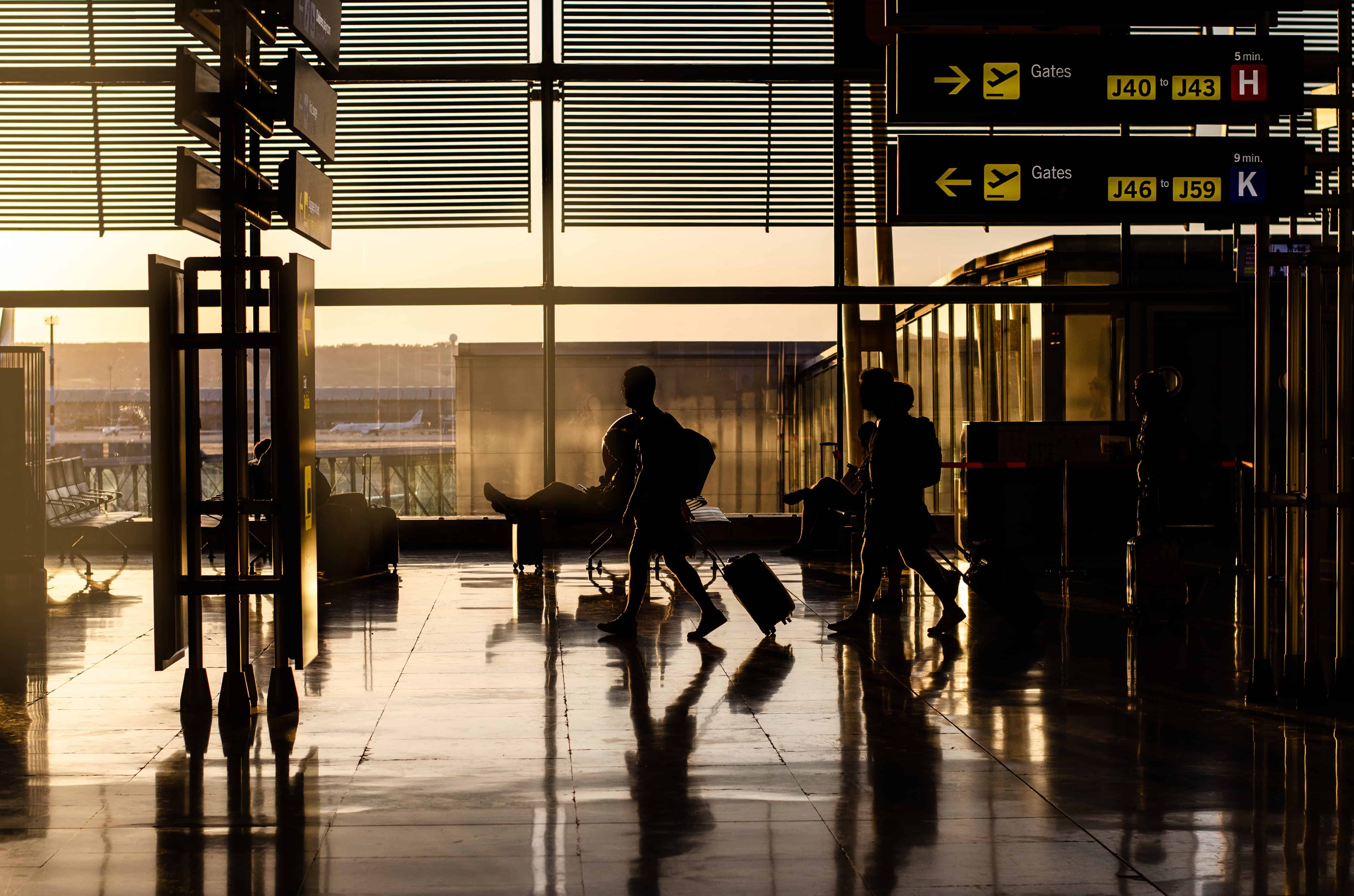 people-walking-inside-airport-terminal